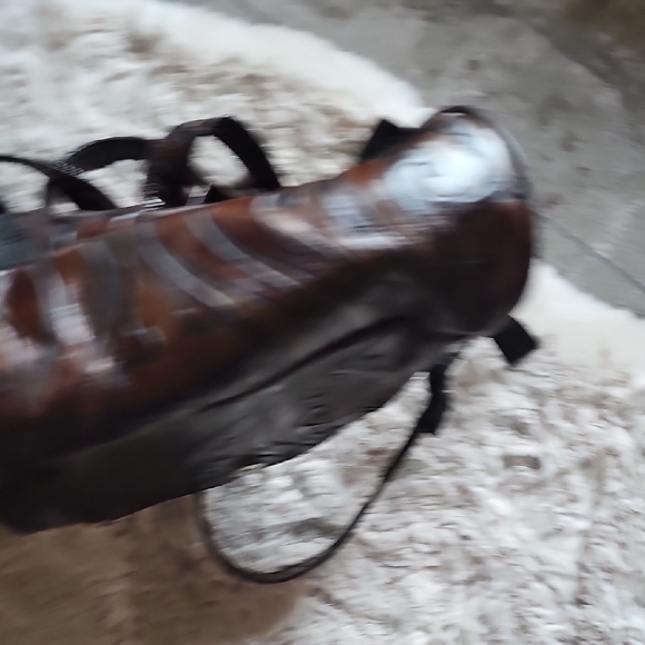 Elegant Brown Leather Backpack with Embossed Design - Picture 7 of 14